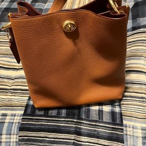 Coach purse In great shape.  There is a little wear but